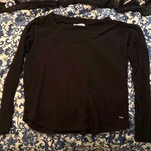 Small long sleeved full-length black top from Hollister